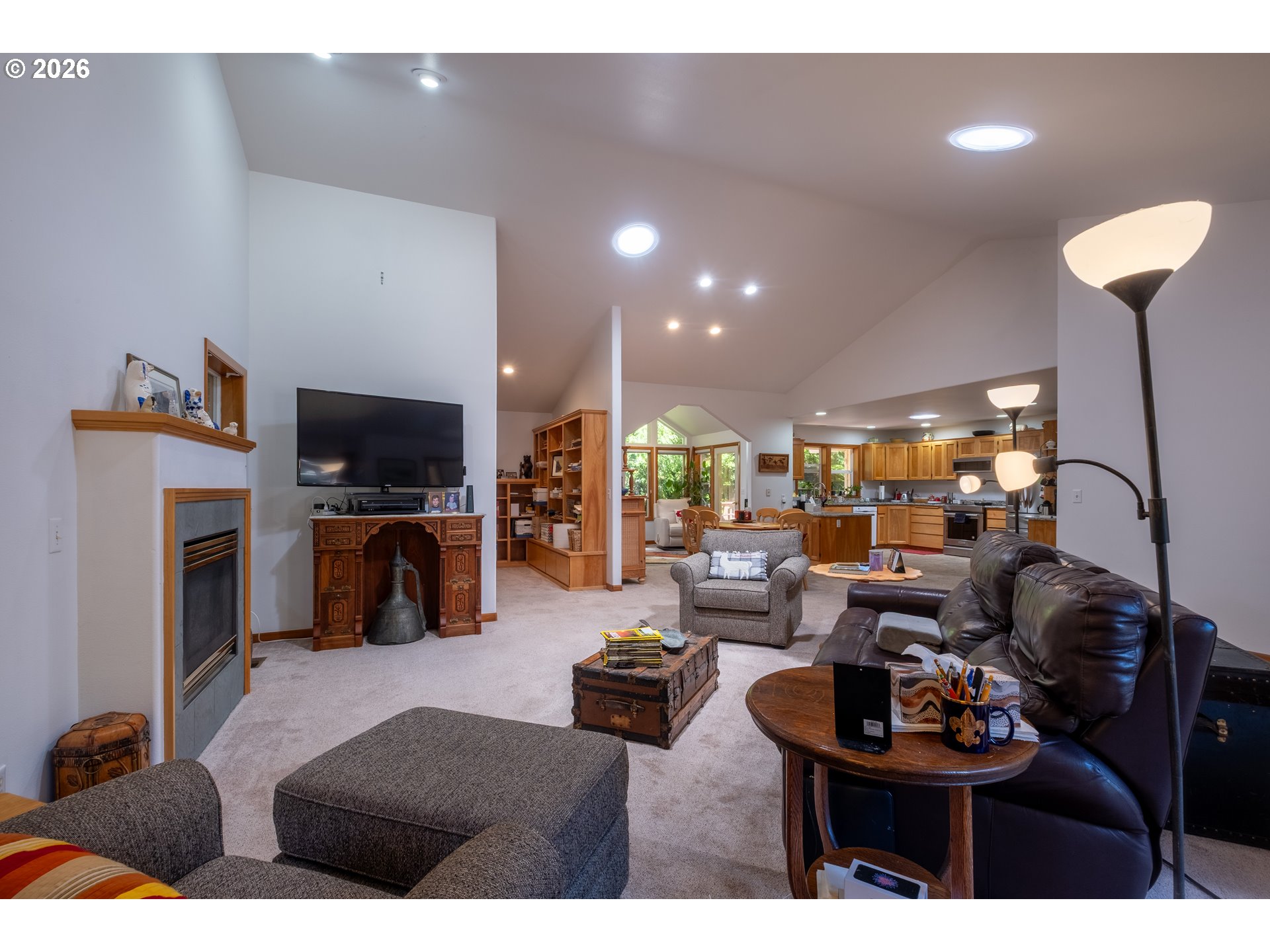 95 Cormorant Depoe Bay, OR 97341 - Photo 10 of 48 a living room with furniture and a flat screen tv