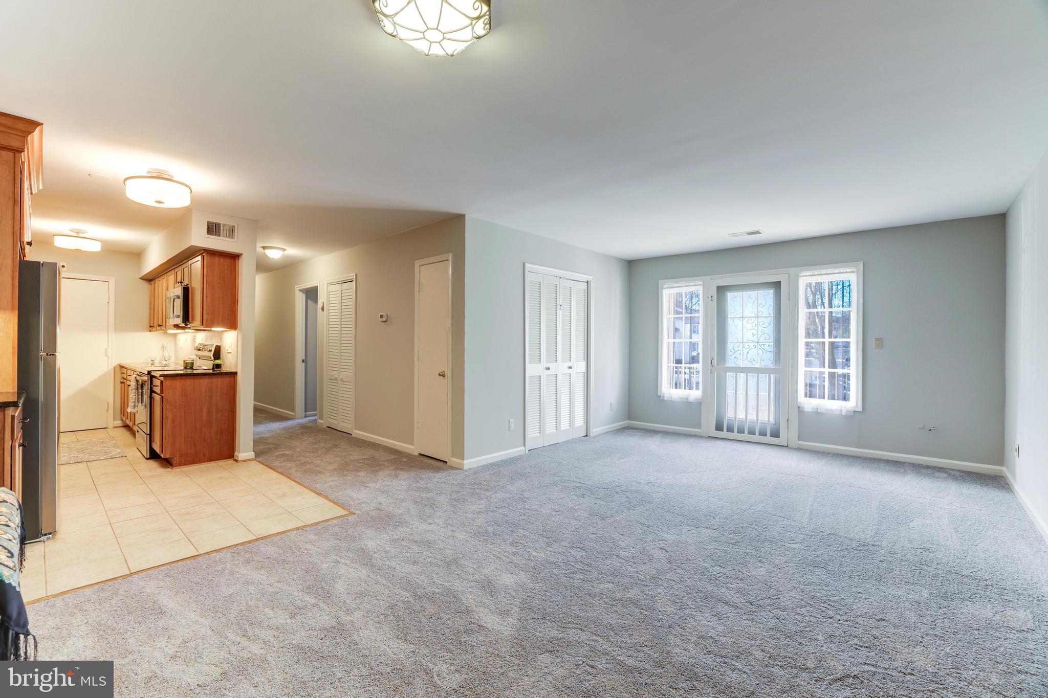 5900 Kingsford Road, Unit 429 Springfield, VA 22152 - Photo 22 of 35 LR W/ VIEW OF KITCHEN
