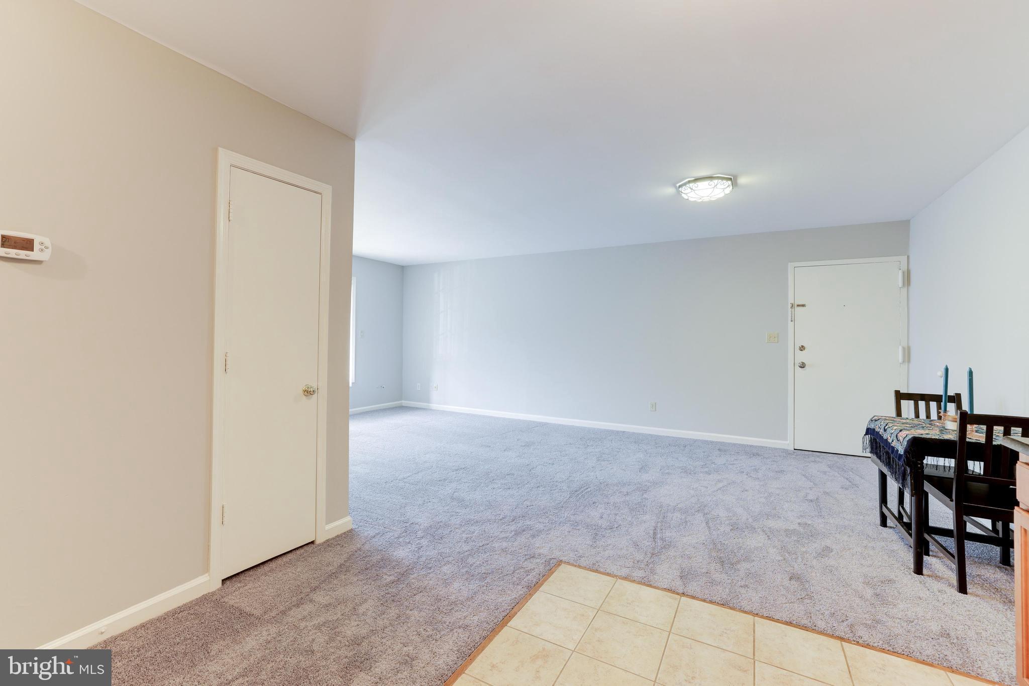 5900 Kingsford Road, Unit 429 Springfield, VA 22152 - Photo 10 of 35 LR/DINING AREA VIEW FROM KITCHEN