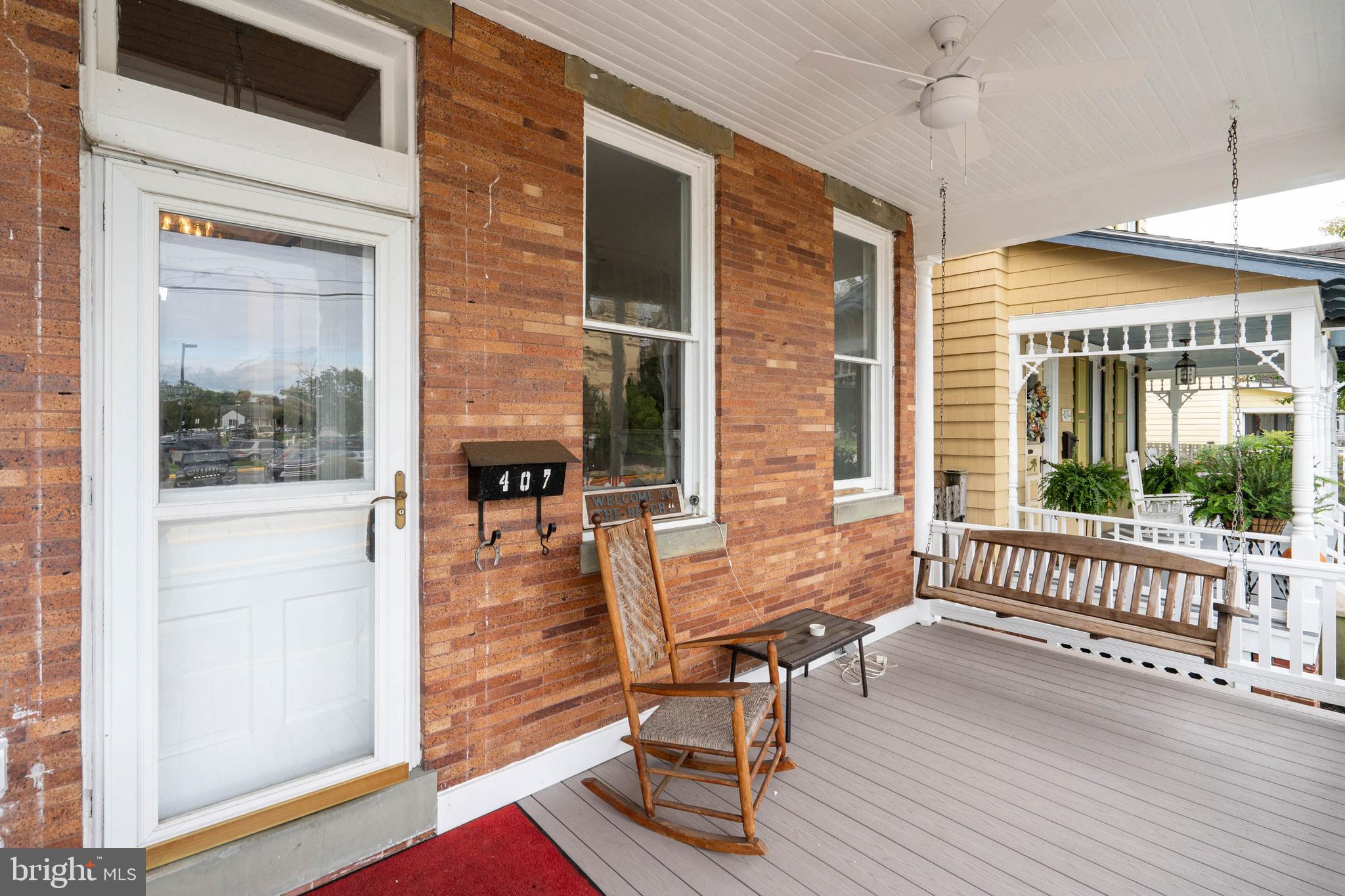 407 Savannah Road Lewes, DE 19958 - Photo 1 of 28 a dining room with wooden floor and windows