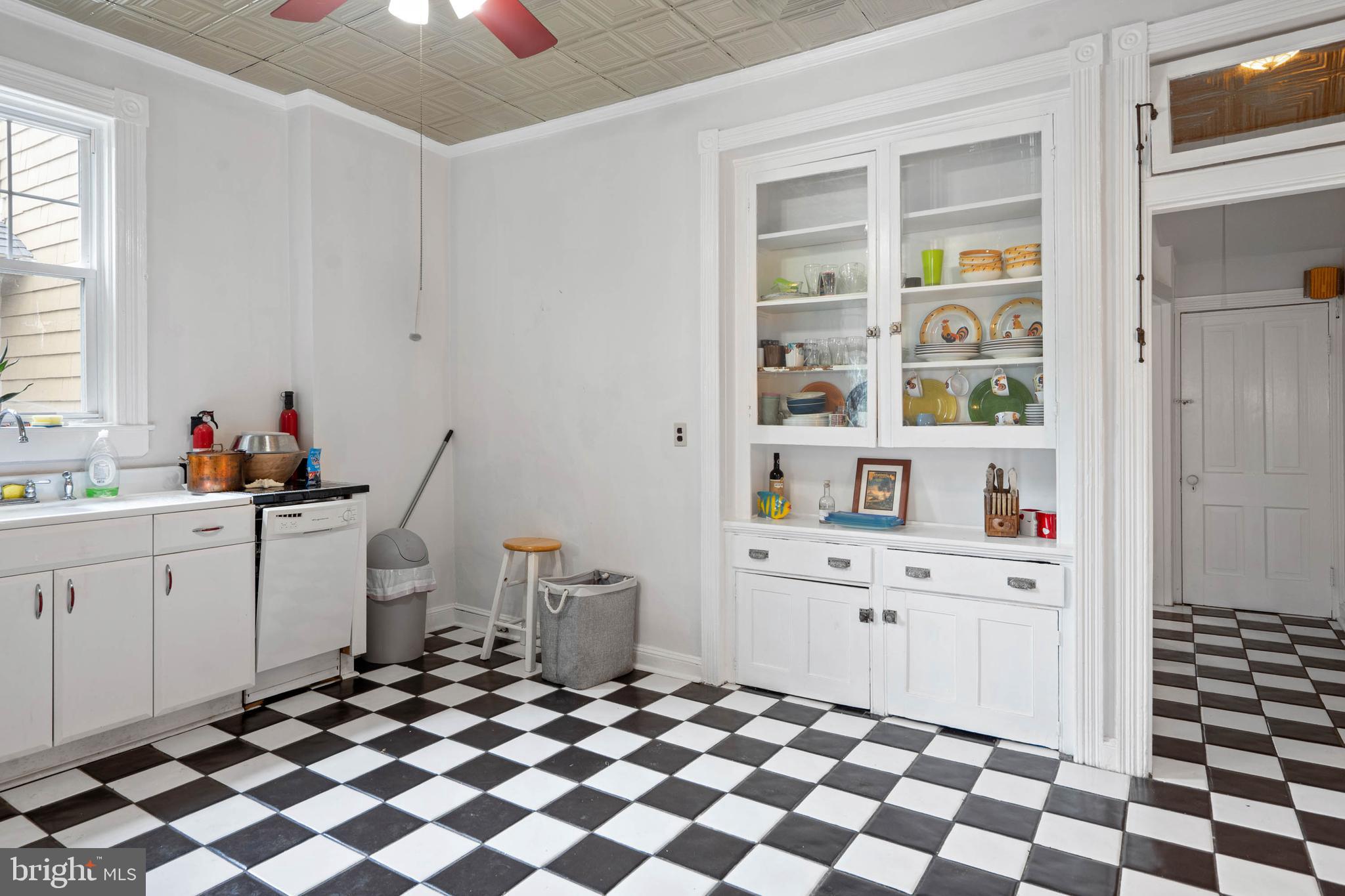 407 Savannah Road Lewes, DE 19958 - Photo 12 of 28 a room with a cabinets and a window