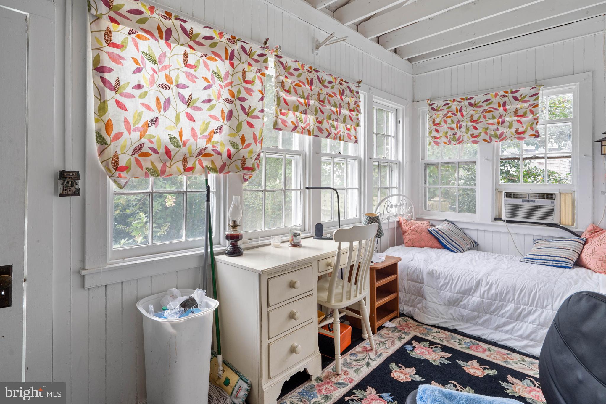 407 Savannah Road Lewes, DE 19958 - Photo 13 of 28 a living room with furniture and a window