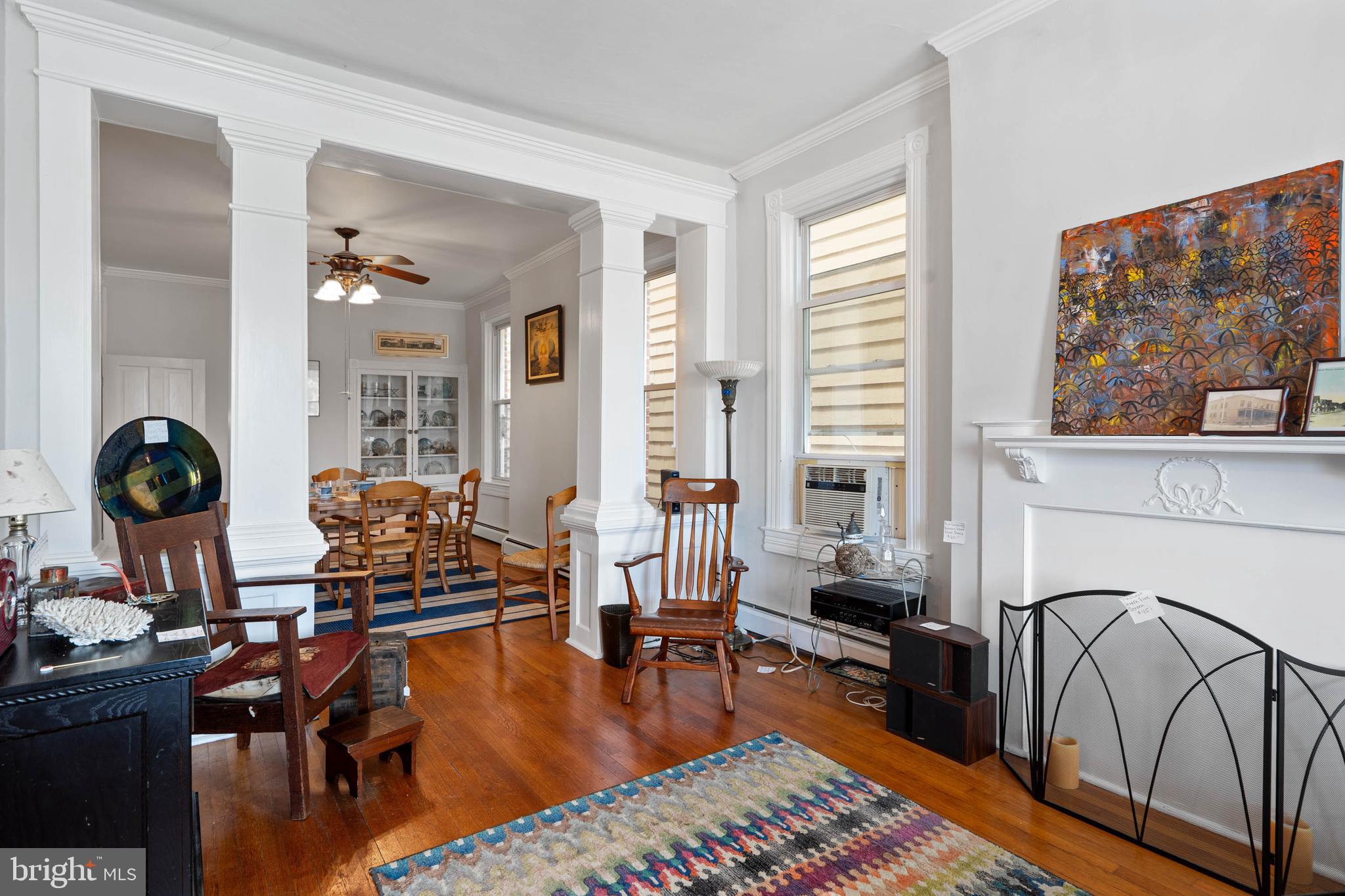 407 Savannah Road Lewes, DE 19958 - Photo 5 of 28 a living room with furniture and a wooden floor