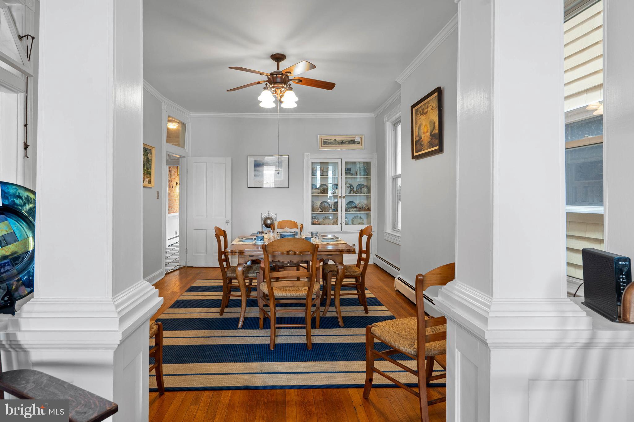 407 Savannah Road Lewes, DE 19958 - Photo 6 of 28 a view of a livingroom with furniture and chandelier