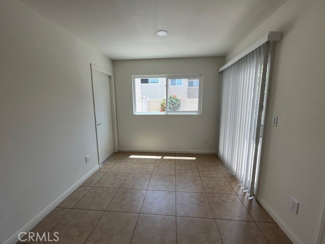 45 Golden Glen Street, Unit 75 Irvine, CA 92604 - Photo 11 of 35 an empty room with windows