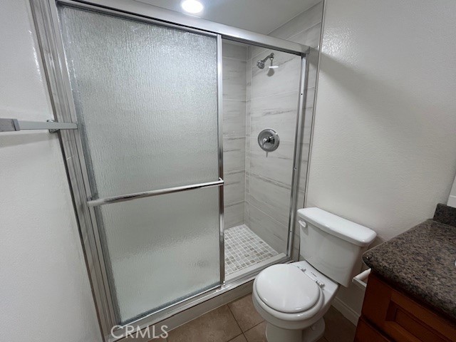 45 Golden Glen Street, Unit 75 Irvine, CA 92604 - Photo 18 of 35 a white toilet sitting next to a shower