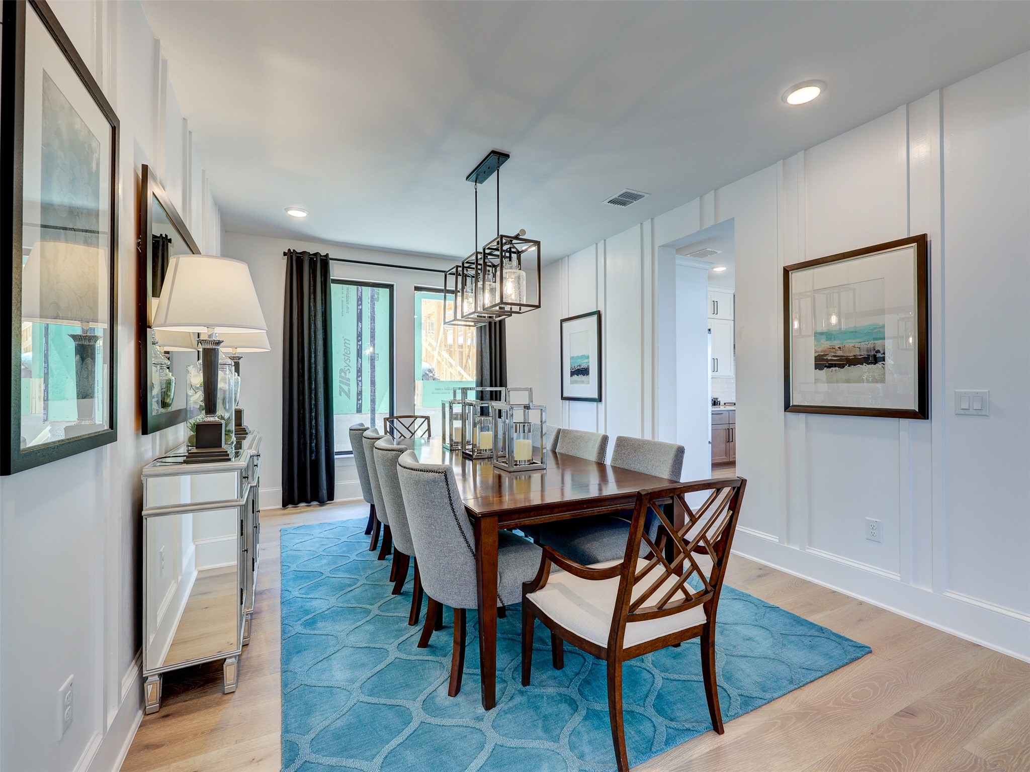 6220 Bower Well Road Austin, TX 78738 - Photo 5 of 28 A striking dining area with hardwood floors, recessed lighting, and ample natural illumination.