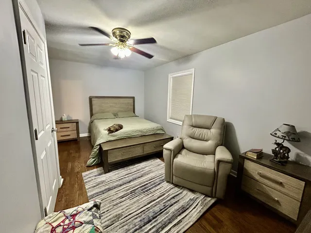 a bed room with a bed and a couch