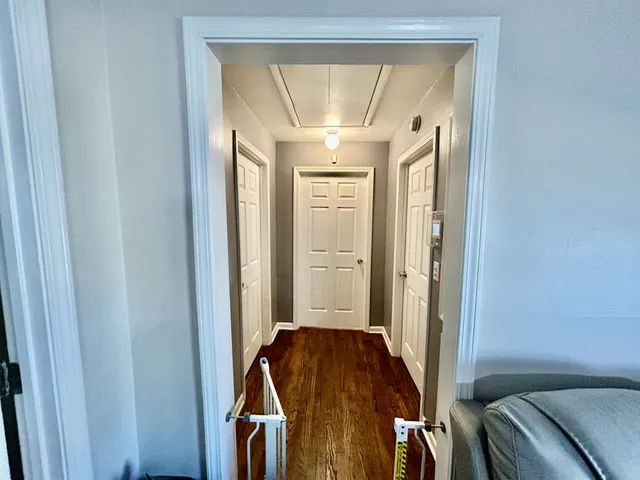 a living room with a bed and furniture