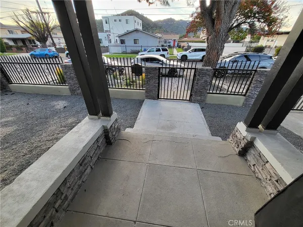a view of a porch with furniture