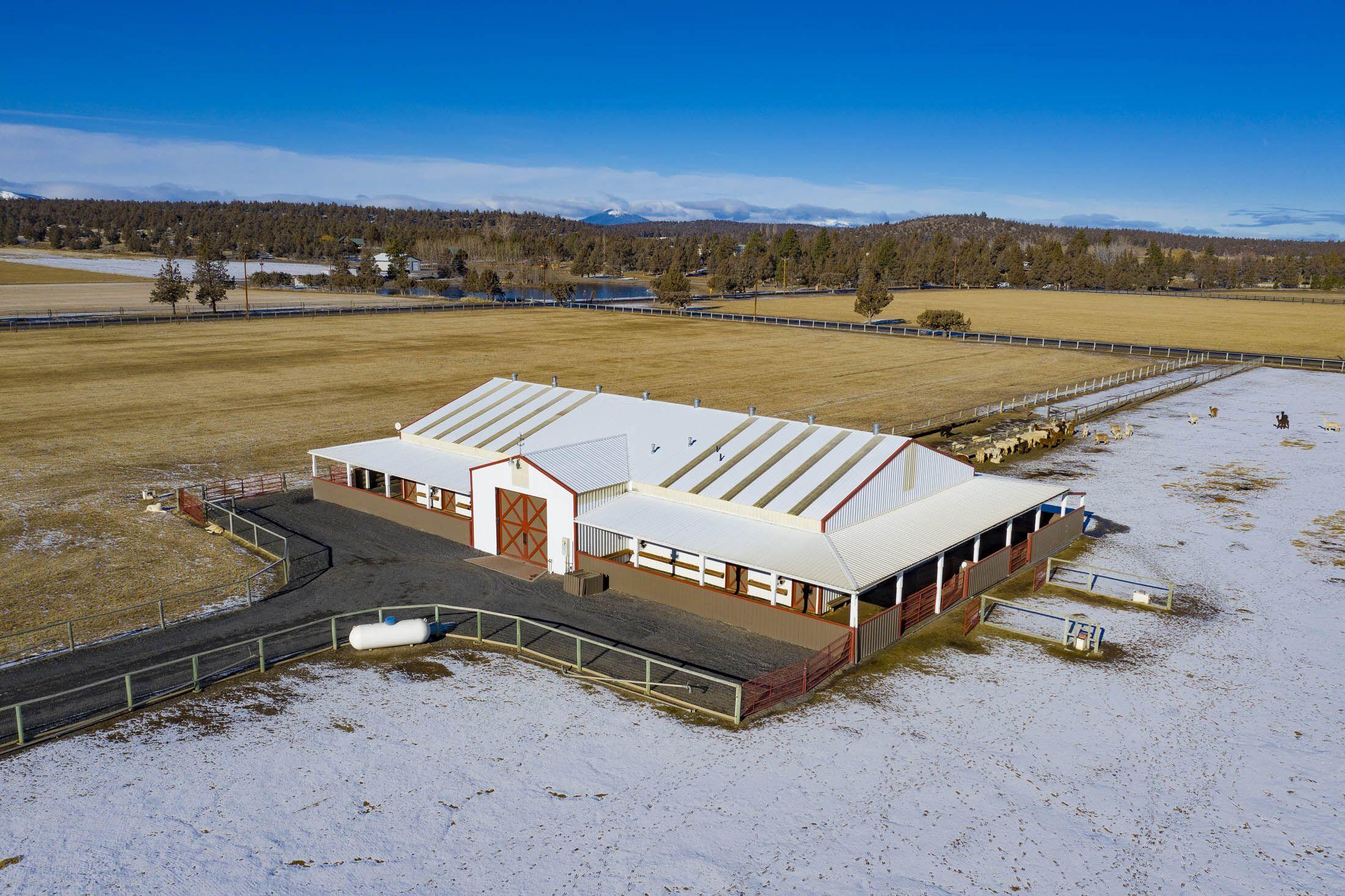 65520 Gerking Market Road Bend, OR 97703 - Photo 27 of 49 Large show barn has 8 livestock stalls, kitchen, half-bath, washer/dryer and finished hayloft with heat and air-conditioning