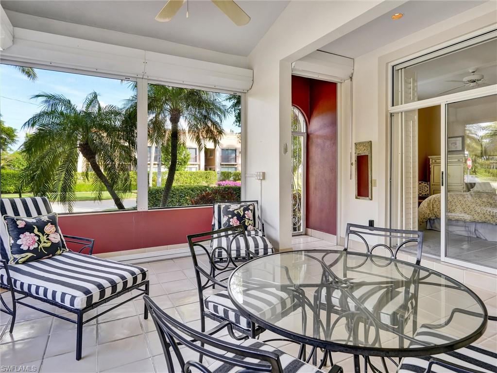 210 2nd Street South, Unit 1C Naples, FL 34102 - Photo 8 of 28 a outdoor dining space with furniture