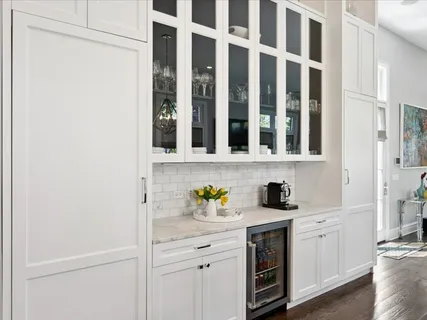 a view of a livingroom with furniture window and wooden floor