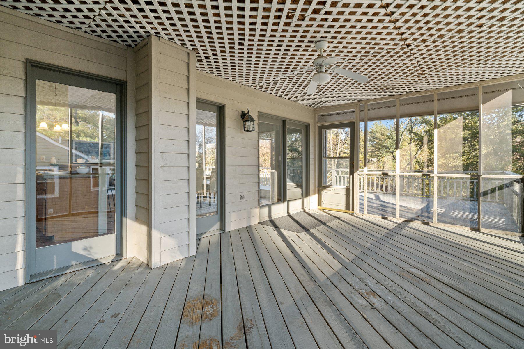 6949 Meadowlake Road New Market, MD 21774 - Photo 11 of 51 Covered screened in porch.