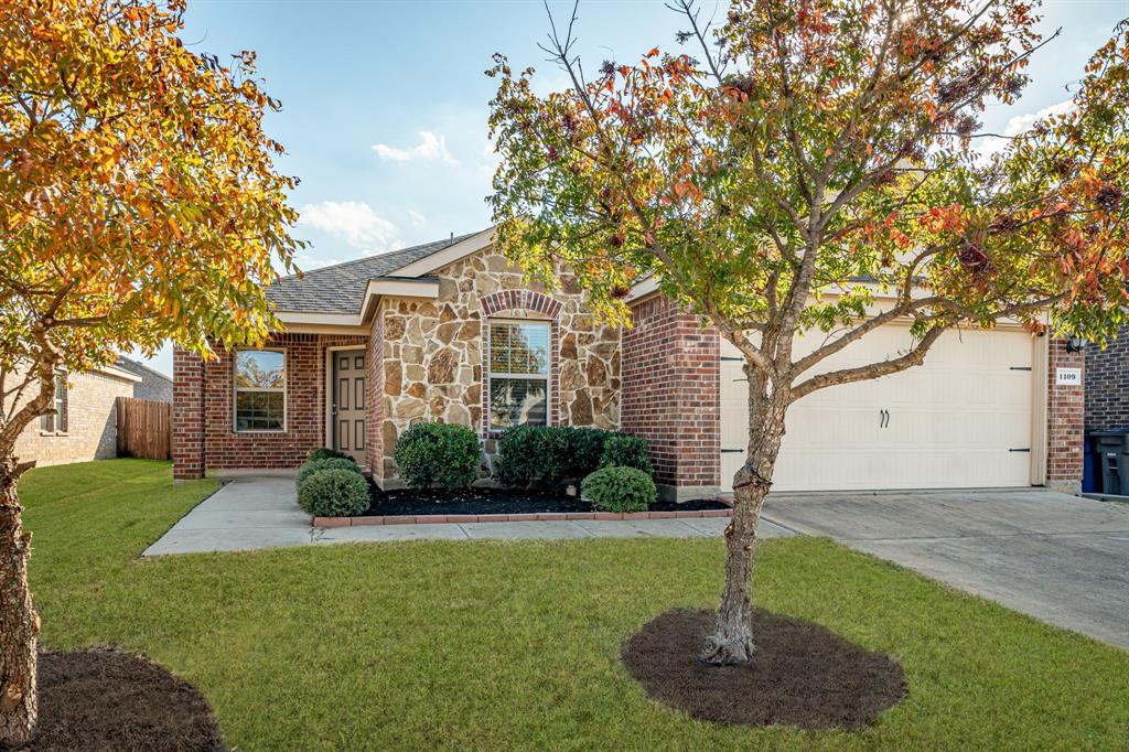1109 Roman Drive Princeton, TX 75407 - Photo 1 of 1 a front view of a house with a yard and tree