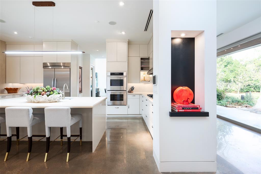 9435 Inwood Road Dallas, TX 75220 - Photo 14 of 37 a kitchen with furniture and a view of kitchen