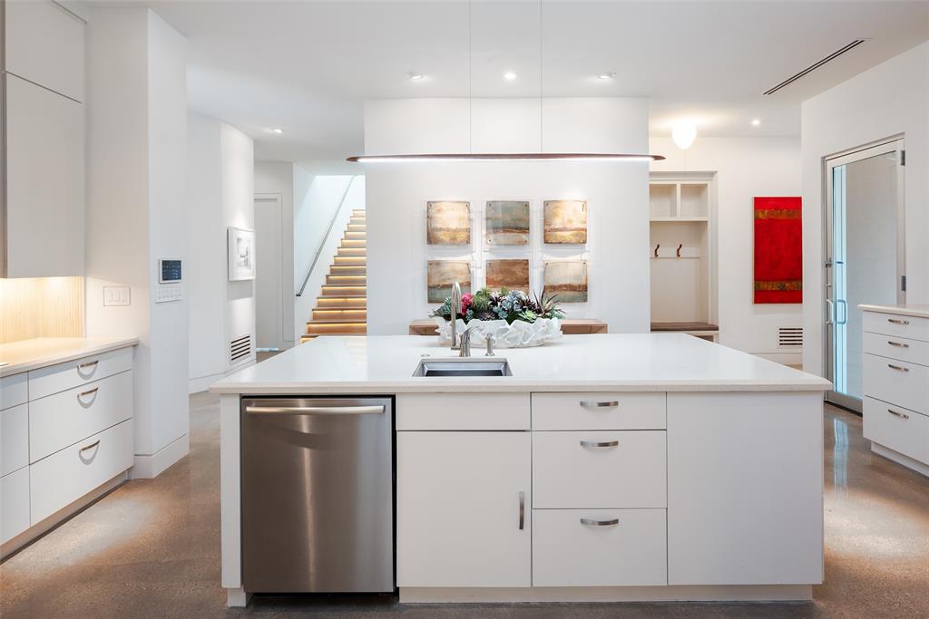 9435 Inwood Road Dallas, TX 75220 - Photo 17 of 37 a bathroom with a sink vanity and mirror