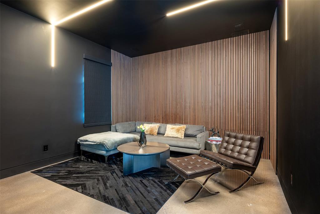 9435 Inwood Road Dallas, TX 75220 - Photo 18 of 37 a living room with furniture and a table