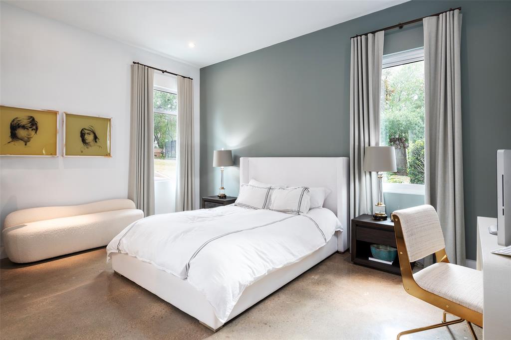 9435 Inwood Road Dallas, TX 75220 - Photo 20 of 37 a bedroom with a bed chair and window