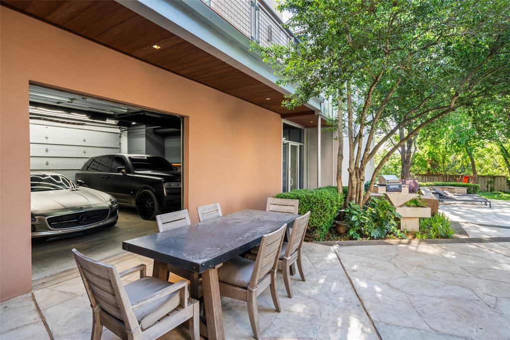 9435 Inwood Road Dallas, TX 75220 - Photo 30 of 37 a view of a patio with a table and chairs and couches