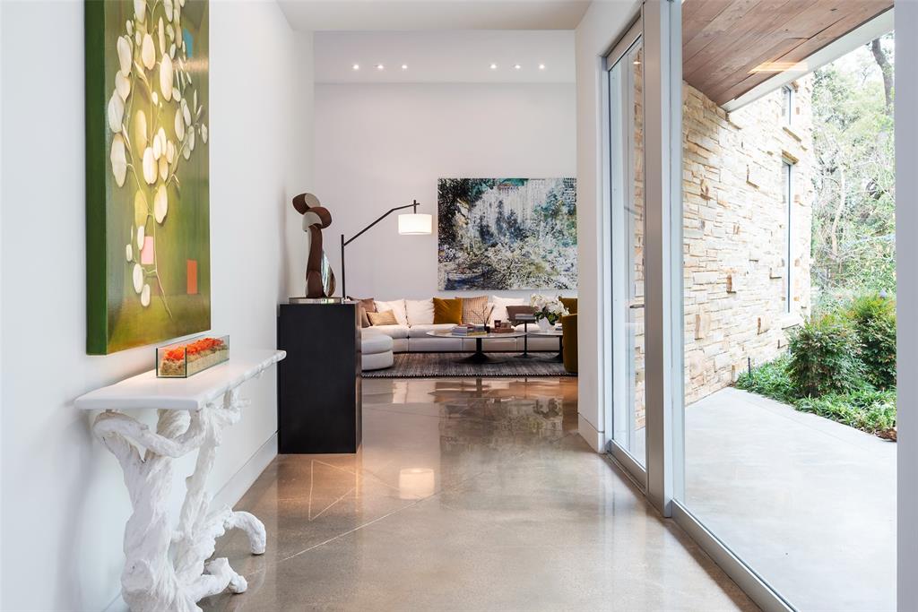 9435 Inwood Road Dallas, TX 75220 - Photo 3 of 37 a view of living room with furniture and floor to ceiling window