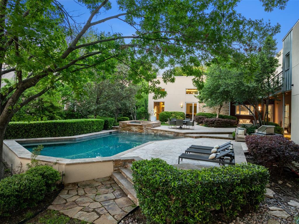 9435 Inwood Road Dallas, TX 75220 - Photo 33 of 37 a view of a backyard with plants and a patio