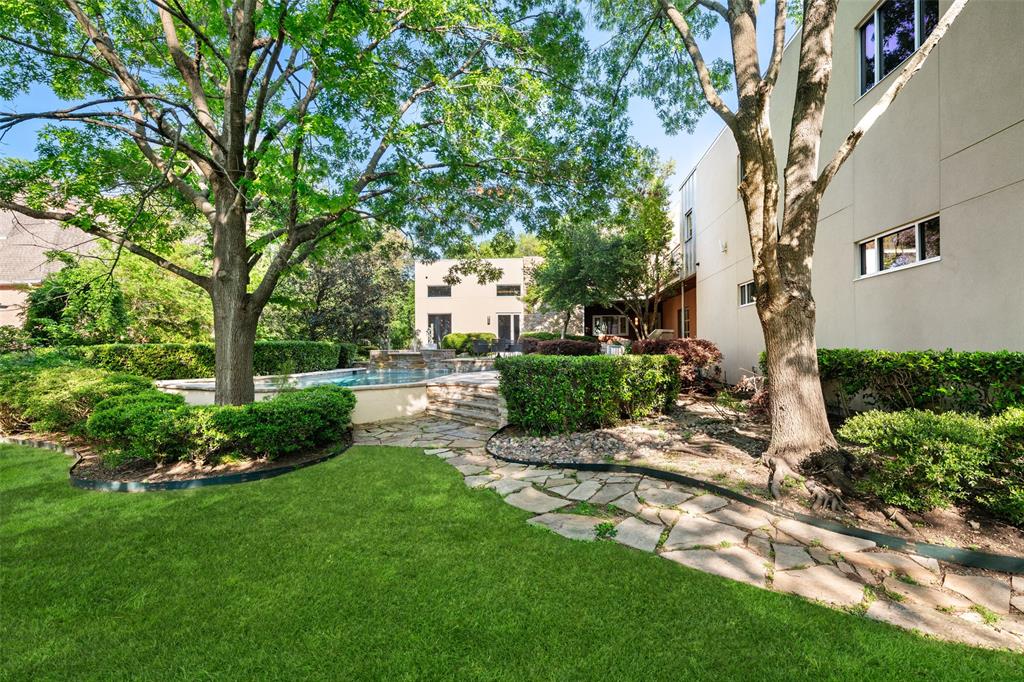 9435 Inwood Road Dallas, TX 75220 - Photo 35 of 37 a view of backyard of house with green space
