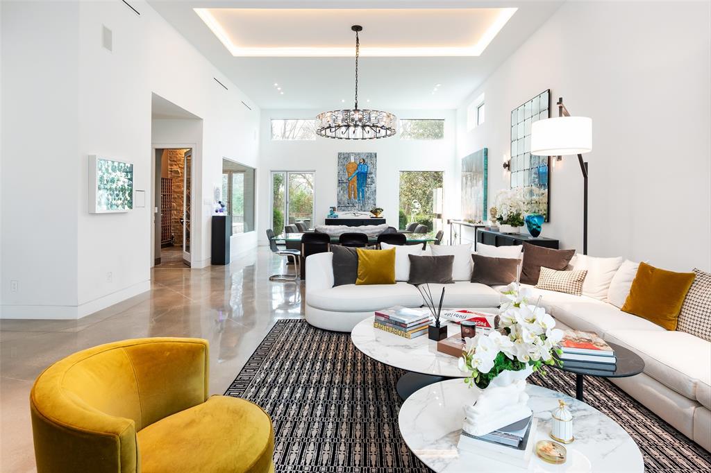 9435 Inwood Road Dallas, TX 75220 - Photo 7 of 37 a living room with furniture or chandelier and a wooden floor