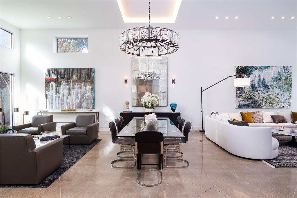 9435 Inwood Road Dallas, TX 75220 - Photo 9 of 37 a living room with furniture and a chandelier