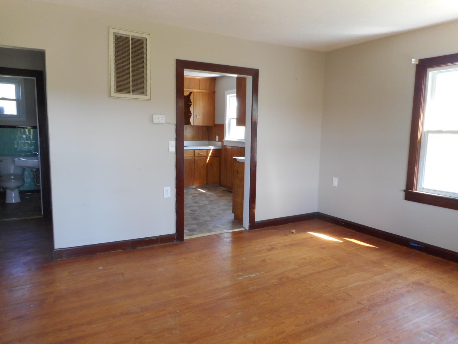18874 Huckleberry Road Elkton, VA 22827 - Photo 10 of 23 a view of an empty room with window and wooden floor