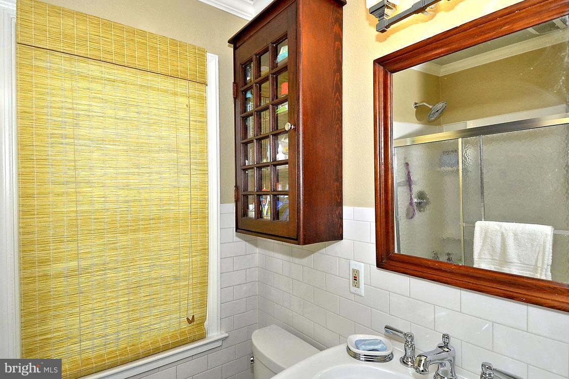 901 Spa Road Annapolis, MD 21401 - Photo 24 of 30 Master Walk-In Closet and Ensuite Bath