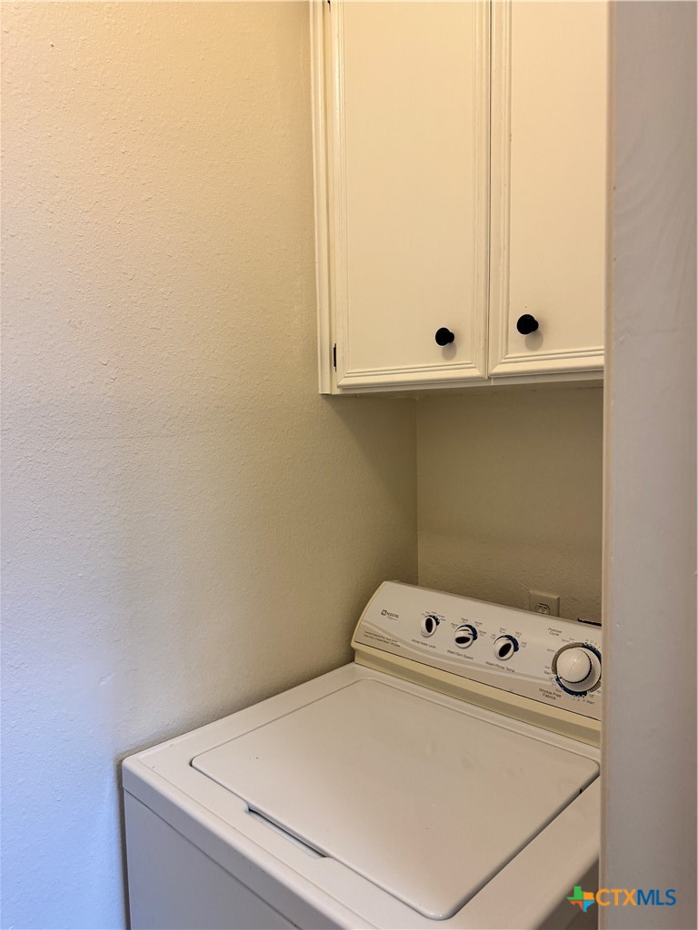 1013 Chestnut Street, Unit D6 San Marcos, TX 78666 - Photo 13 of 13 a utility room with dryer and washer