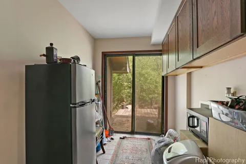 a living room with furniture windows and a table