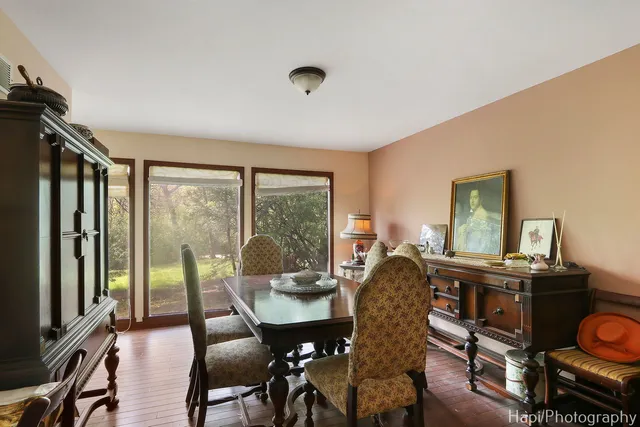 a view of a dining room with furniture window and outside view