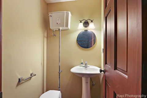 a bathroom with a sink and mirror