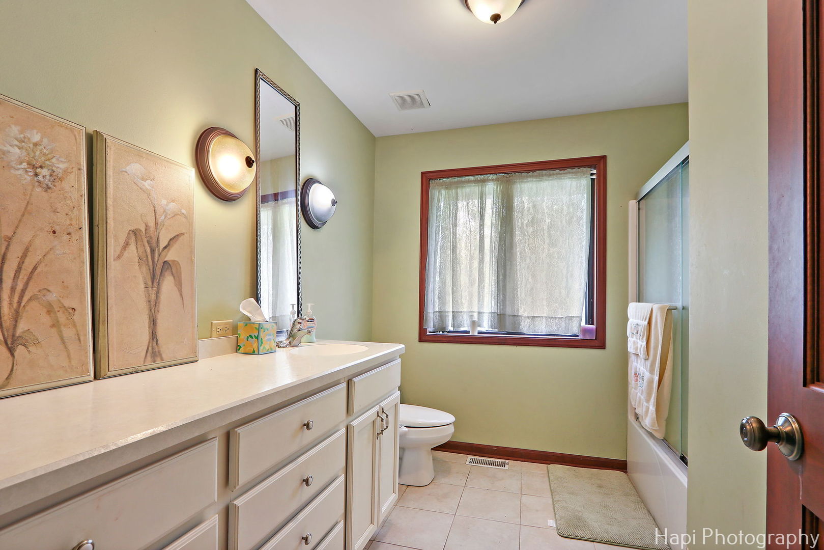 24570 West Middle Frk Road Barrington, IL 60618 - Photo 18 of 31 a bathroom with a double vanity sink mirror and a toilet
