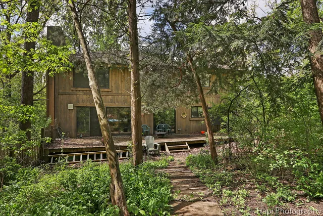 a backyard of a house with lots of green space