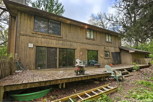 a view of house with chair and tables