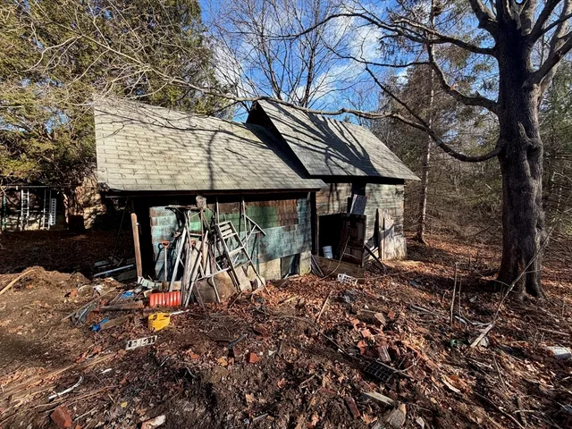 a backyard of a house with lots of green space