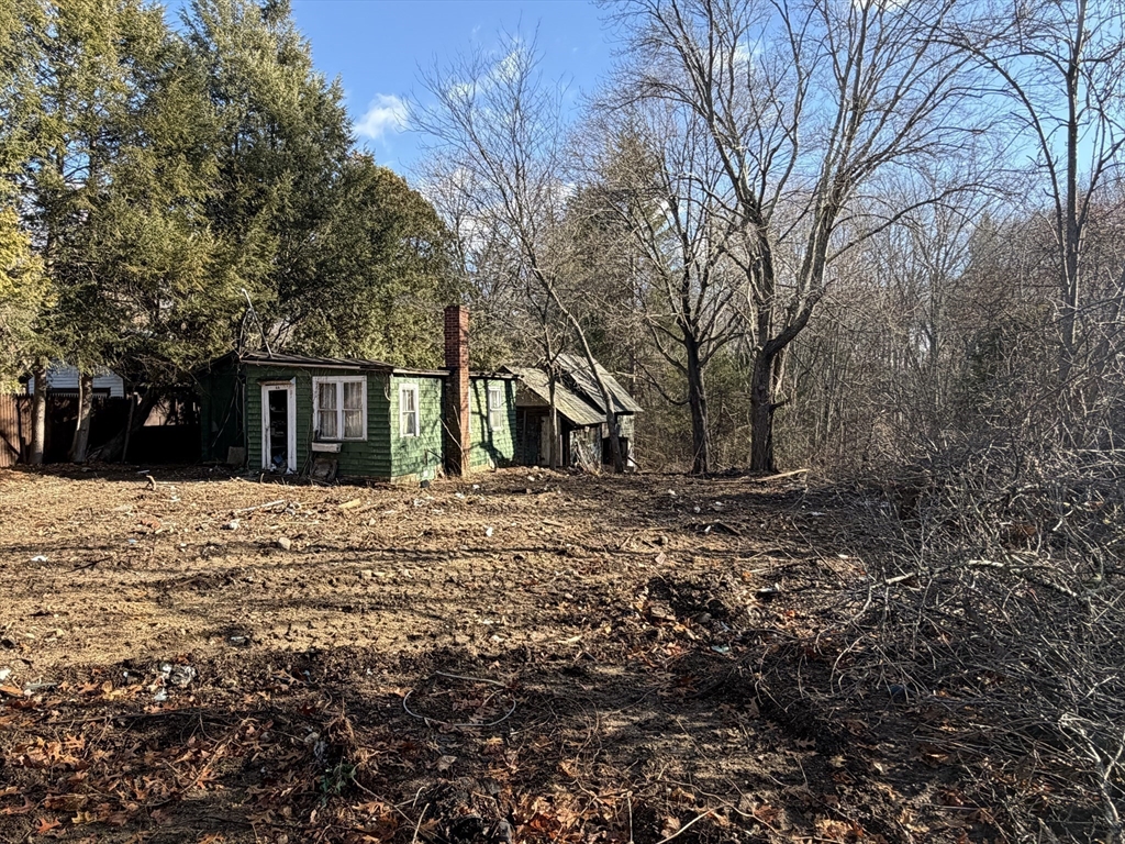 44 Federal Street Blackstone, MA 01504 - Photo 4 of 20 a front view of a house with a yard