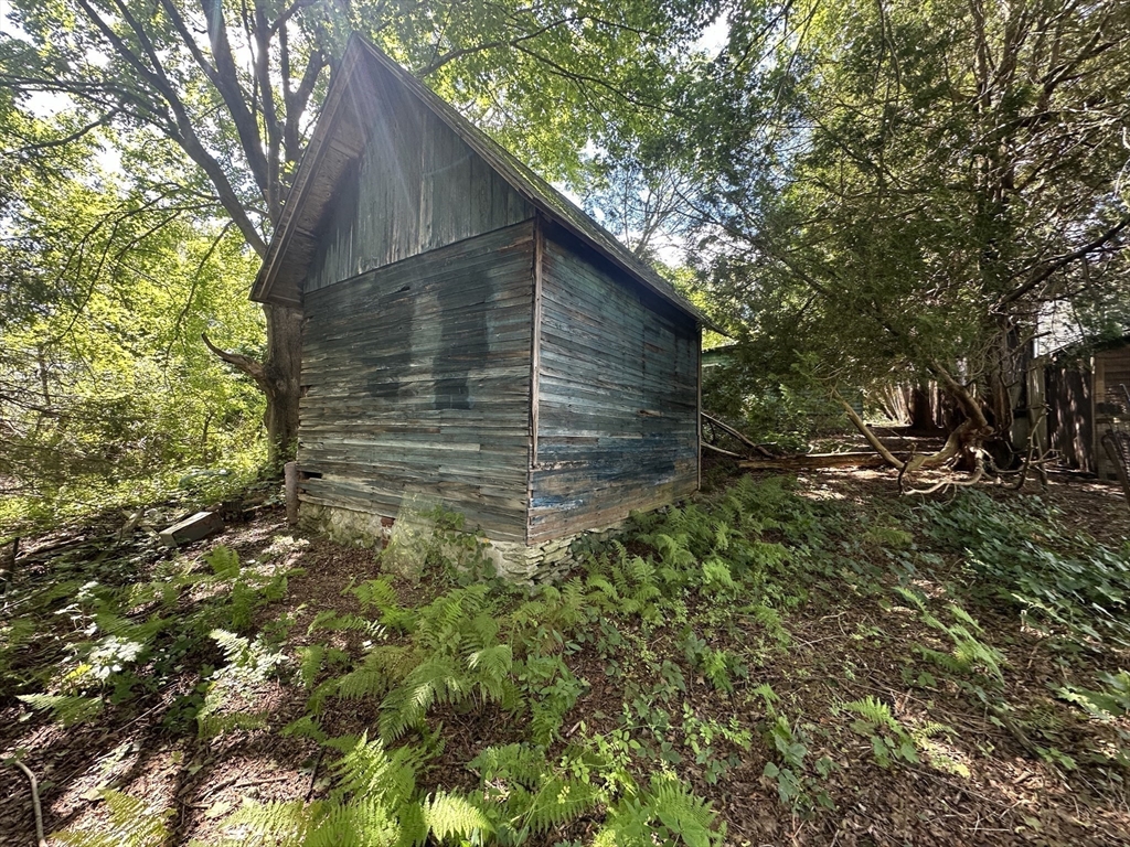44 Federal Street Blackstone, MA 01504 - Photo 6 of 20 a backyard of a house with lots of green space