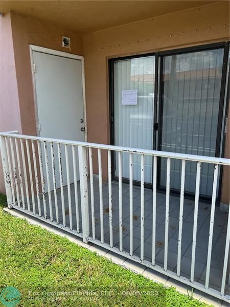 6041 West 24th Avenue, Unit 101 Hialeah, FL 33016 - Photo 8 of 8 a view of a backyard