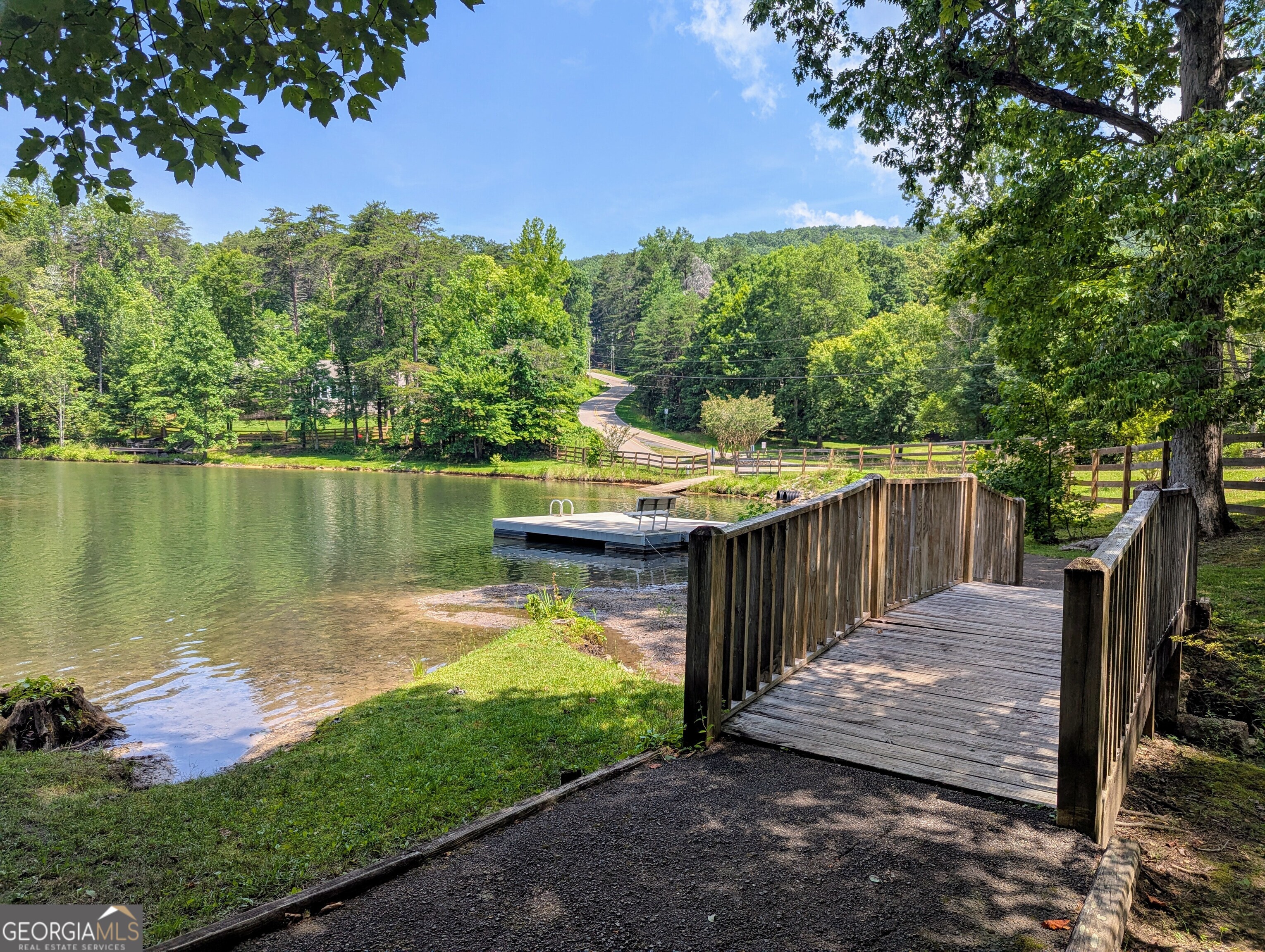 0 Mulberry Circle Jasper, GA 30143 - Photo 7 of 9 a view of a wooden deck with a lake view