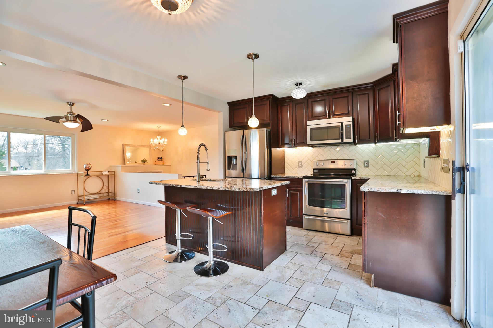 6022 Point Pleasant Road Baltimore, MD 21206 - Photo 6 of 23 Breakfast bar with granite counters!