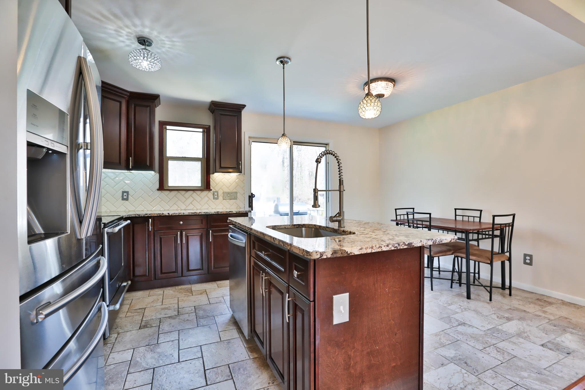 6022 Point Pleasant Road Baltimore, MD 21206 - Photo 8 of 23 four door stainless steel fridge!