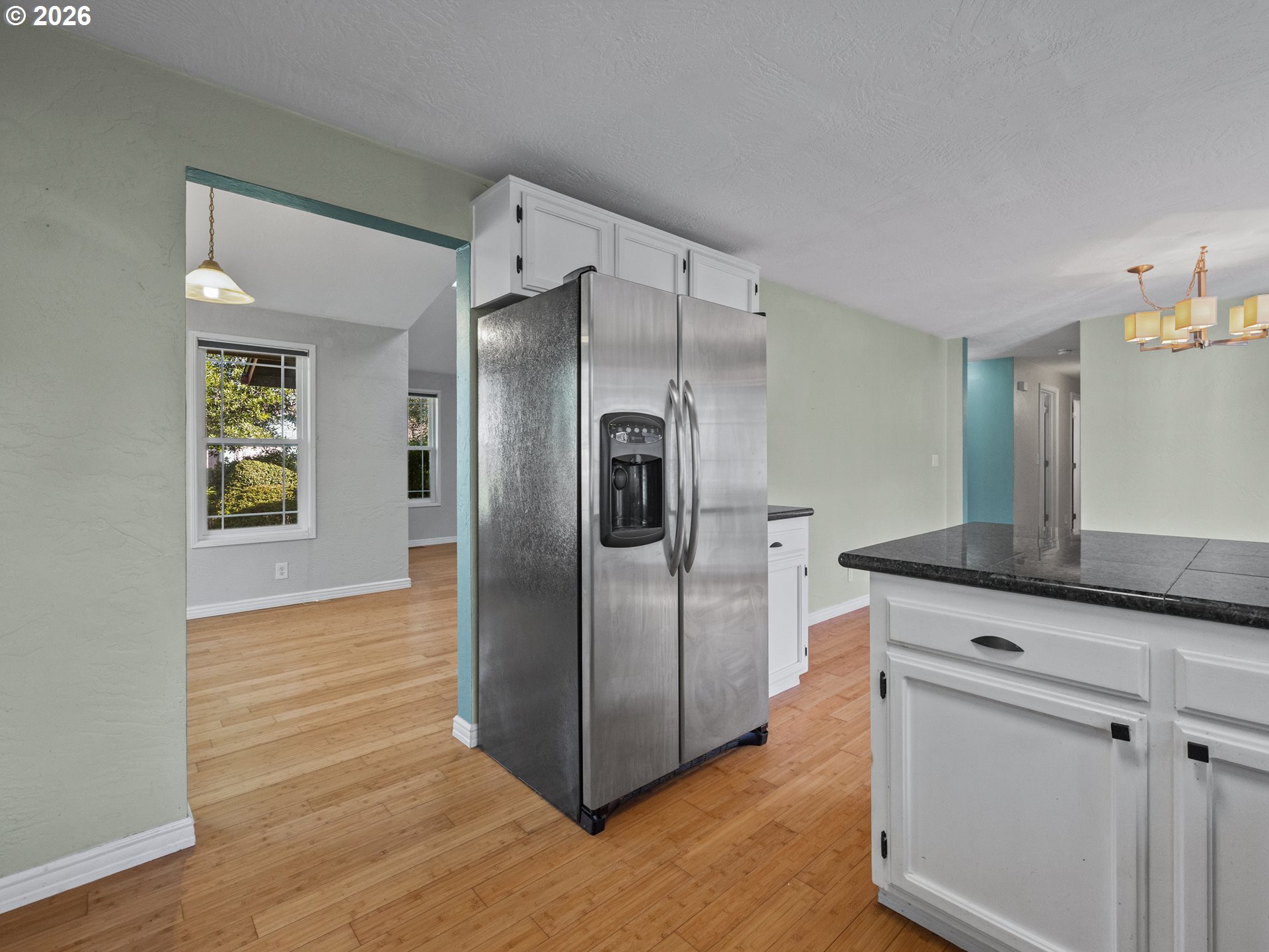 2066 40th Street Florence, OR 97439 - Photo 21 of 48 a kitchen with stainless steel appliances granite countertop a refrigerator and a stove