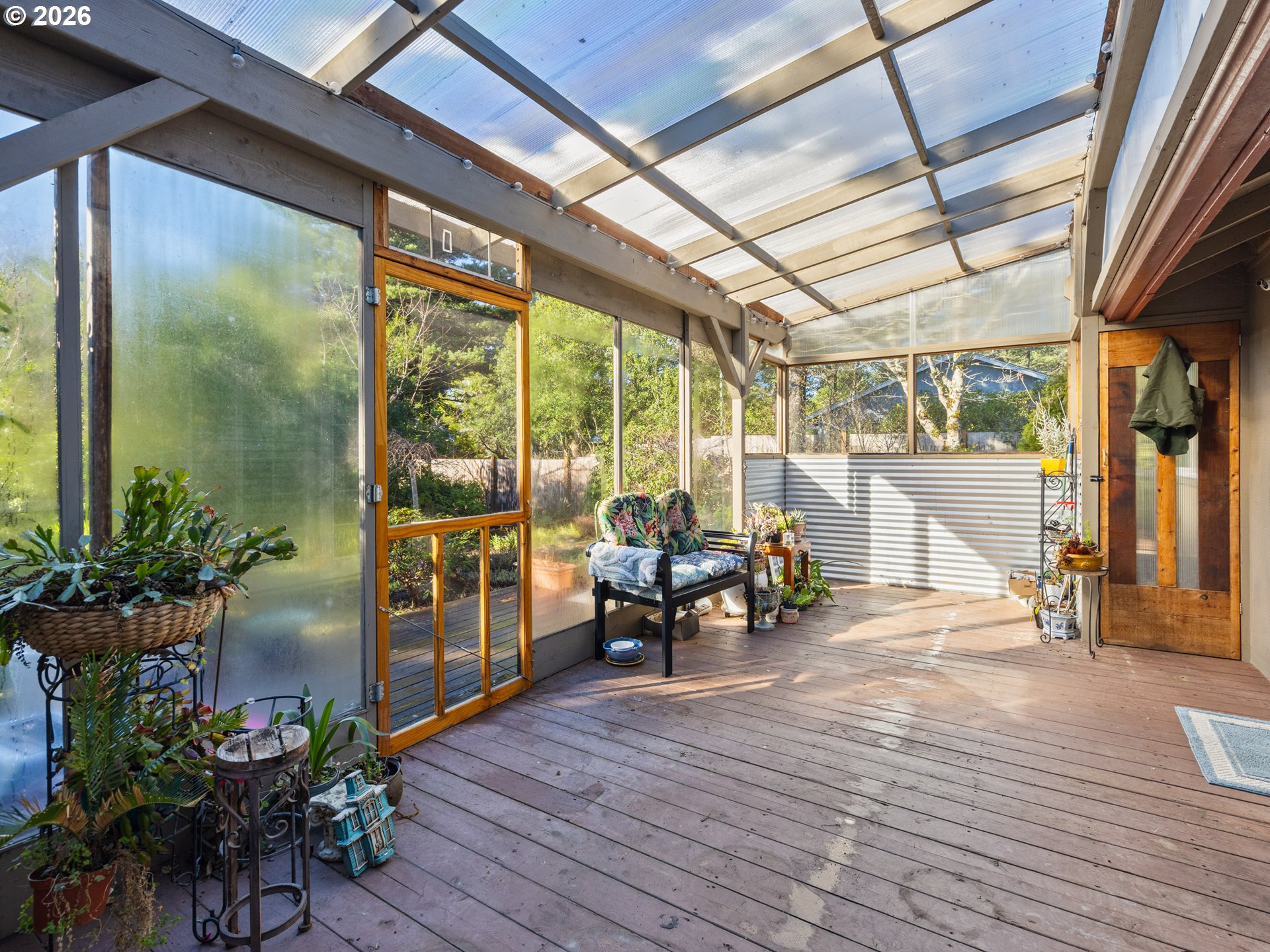 2066 40th Street Florence, OR 97439 - Photo 30 of 48 a view of a porch with wooden floor
