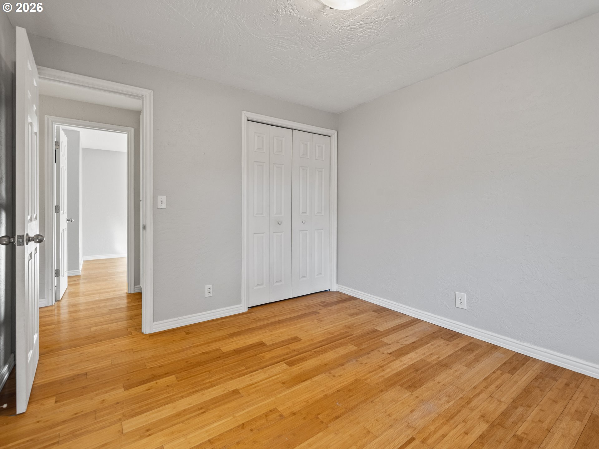 2066 40th Street Florence, OR 97439 - Photo 41 of 48 a view of an empty room with wooden floor