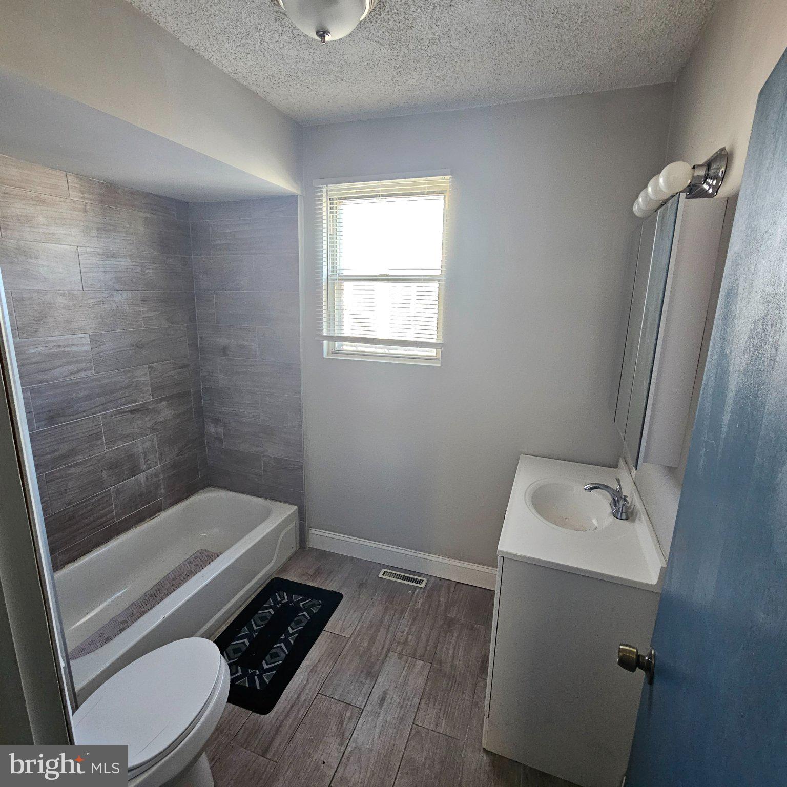 3963 Wyalusing Avenue Philadelphia, PA 19104 - Photo 5 of 14 Modern bathroom with natural light.