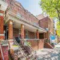 759 57th Street Brooklyn, NY 11220 - Photo 2 of 6 a view of a building with large tree
